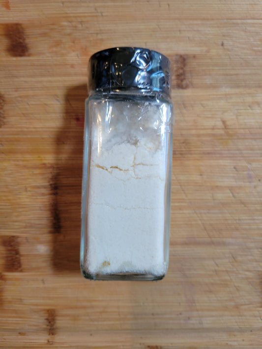 Savory Vanilla Popcorn Seasoning Salt, perfect for enhancing popcorn and other dishes.