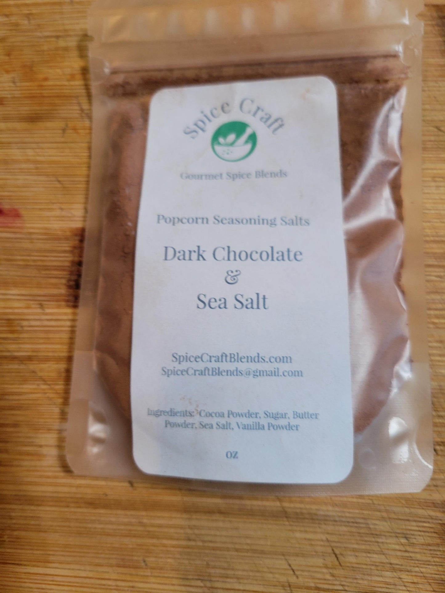 Dark Chocolate & Sea Salt Popcorn Seasoning, perfect for enhancing popcorn and desserts.
